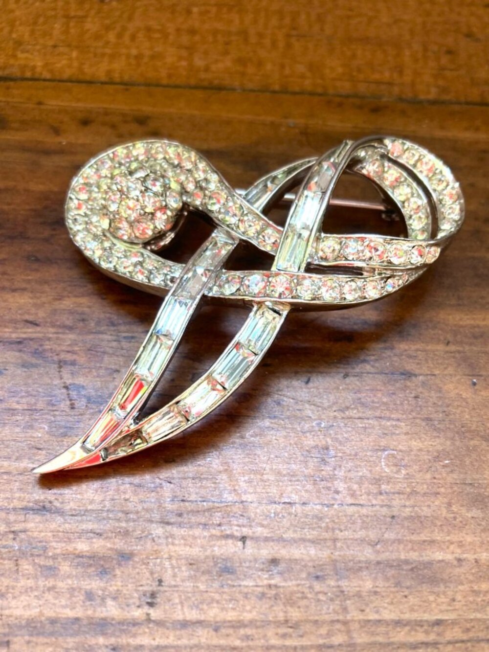 Signed and numbered Boucher sparking ribbon brooch